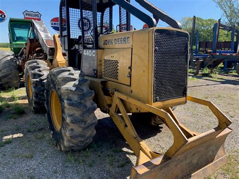 The other has the transmission out of it, the trans has been rebuilt, but has not been put back in the skidder. . John deere 440c skidder weight
